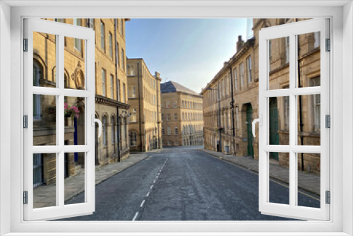 Fototapeta Naklejka Na Ścianę Okno 3D - Currer Street, in the heart of former textile buildings, built with Yorkshire stone in, Little Germany, Bradford, UK