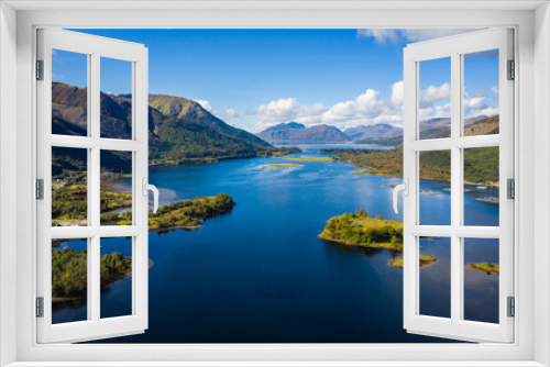 Fototapeta Naklejka Na Ścianę Okno 3D - aerial view of loch linnhe in summer near duror and ballachulish and glencoe in the argyll region of the highlands of scotland showing blue water and green fertile coast line