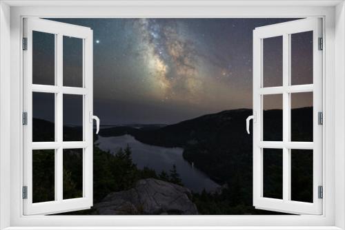 Fototapeta Naklejka Na Ścianę Okno 3D - Milky Way Galaxy over Jordan Pond from North Bubble Rock in Acadia National Park