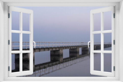 Fototapeta Naklejka Na Ścianę Okno 3D - Pier reflection on a misty morning