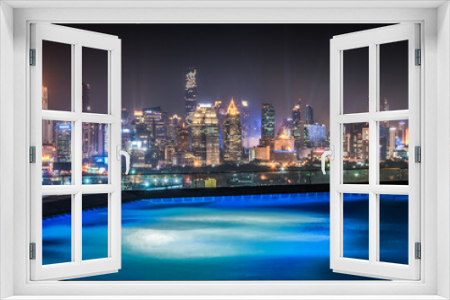 Fototapeta Naklejka Na Ścianę Okno 3D - Cityscape of Bangkok with Skyscrapers as Seen from Roof Top with Swimming Pool