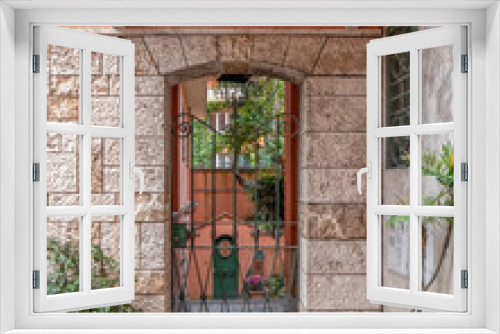 Fototapeta Naklejka Na Ścianę Okno 3D - vintage house front entrance metallic railings door, Rome Italy