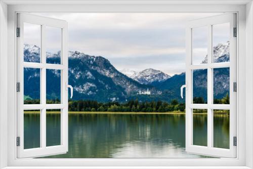 Fototapeta Naklejka Na Ścianę Okno 3D - Amazing views from the Forggensee lake in Germany with view of neuschwanstein castle 