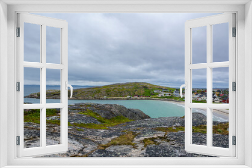 Fototapeta Naklejka Na Ścianę Okno 3D - View from the rocks to the fishing village Bugoynes (Pykeija) and Barents Sea, Varangerfjord, Norway