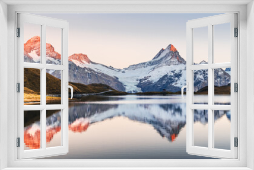 Fototapeta Naklejka Na Ścianę Okno 3D - Wide panorama of Bachalpsee lake in Swiss Alps mountains. Snowy peaks of Wetterhorn, Mittelhorn and Rosenhorn on background. Grindelwald valley, Switzerland. Landscape photography