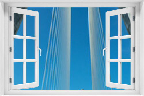 Fototapeta Naklejka Na Ścianę Okno 3D - Detail of suspension bridge, support tower and tie rods or tension cables