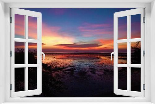 Fototapeta Naklejka Na Ścianę Okno 3D - Colorful sunset over low tide