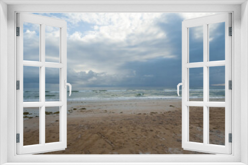 Fototapeta Naklejka Na Ścianę Okno 3D - Ormond Beach at sunrise with colorful clouds sand and ocean