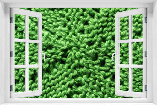 Fototapeta Naklejka Na Ścianę Okno 3D - Full frame macro art abstract view of a green crocheted yarn doily texture on a dark blue background, with copy space.