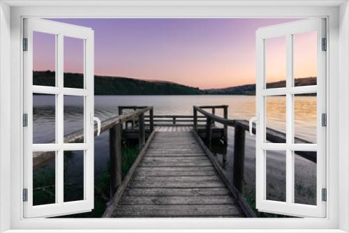 Fototapeta Naklejka Na Ścianę Okno 3D - Muelle Lago, anocheciendo