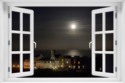 Luxury Apartment building with Full Moon