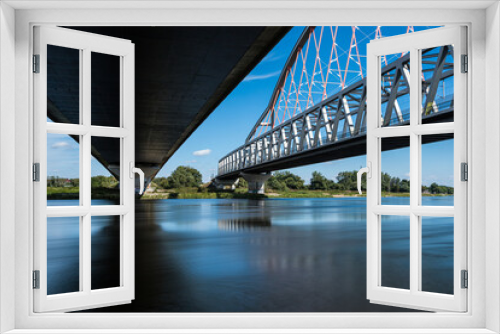 Fototapeta Naklejka Na Ścianę Okno 3D - two bridges over the river Elbe near Wittenberg