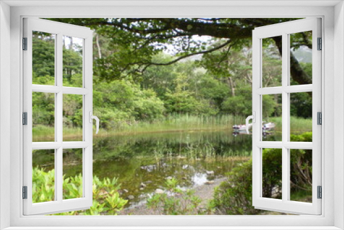 Fototapeta Naklejka Na Ścianę Okno 3D - Scenic view of irish landscape and water reflection 