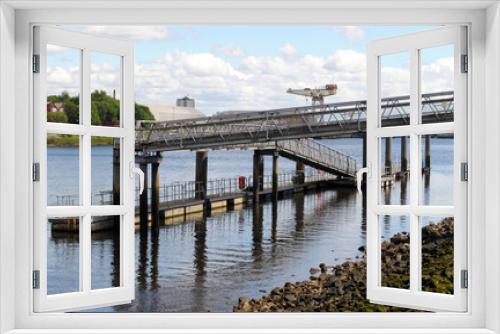 Fototapeta Naklejka Na Ścianę Okno 3D - River View of Modern Steel Jetty & Beach