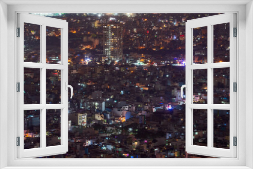 Fototapeta Naklejka Na Ścianę Okno 3D - Nightscape of Ho Chi Minh City near residential area.