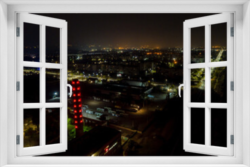 Fototapeta Naklejka Na Ścianę Okno 3D - Aerial photo of city lights at night small town
