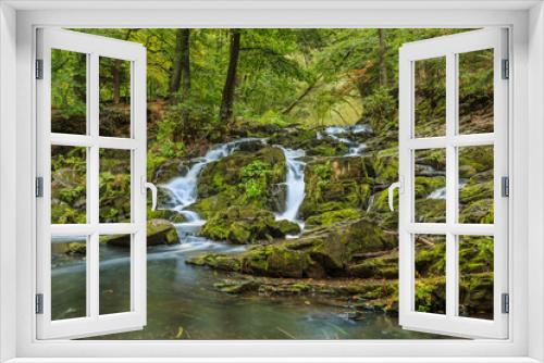 Fototapeta Naklejka Na Ścianę Okno 3D - Selke waterfall with rocks in the southern Harz. River in the Harz with moss-covered stones. Ferns and deciduous trees on the riverside in autumn