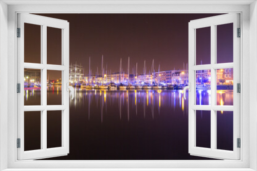 Fototapeta Naklejka Na Ścianę Okno 3D - Night city Rouen in France, the pier of expensive yachts.