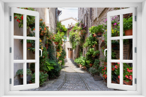 Fototapeta Naklejka Na Ścianę Okno 3D - Charming floral decorated streets of medieval towns of Italy. Spello in Umbria