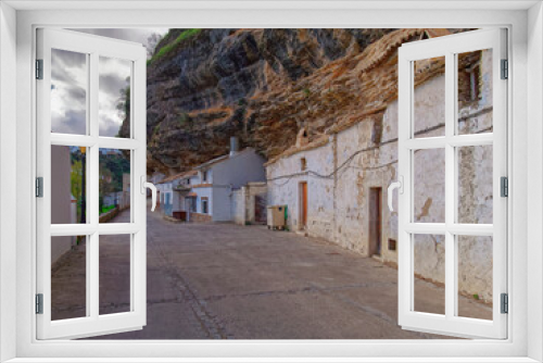 Fototapeta Naklejka Na Ścianę Okno 3D - View of Streets and Houses on Rocks in Setenil de las Bodegas city