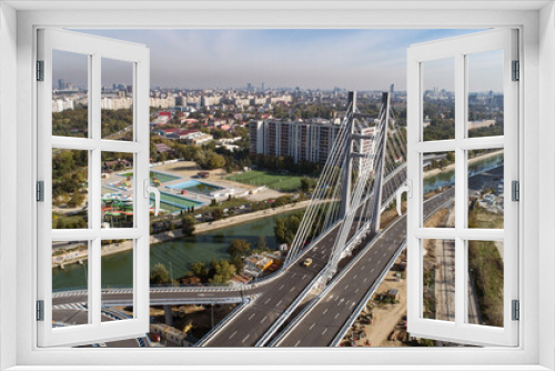 Fototapeta Naklejka Na Ścianę Okno 3D - Aerial view of the Ciurel Passage Suspended Bridge on a sunny day.