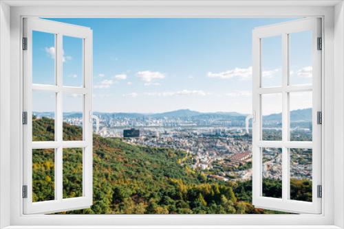 Fototapeta Naklejka Na Ścianę Okno 3D - Panoramic view of Seoul city and mountains from Namsan tower in Seoul, Korea