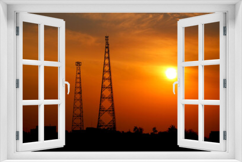 Fototapeta Naklejka Na Ścianę Okno 3D - sunset view with two telecommunication tower