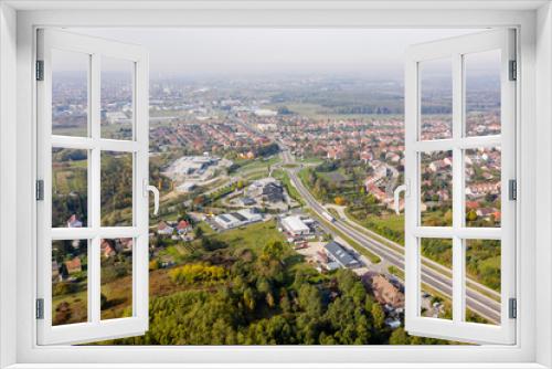 Drone photo of a roundabout in Csacs district on a foggy autumn morning in City Zalaegerszeg, Hungary