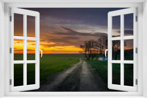Fototapeta Naklejka Na Ścianę Okno 3D - small lonely house at sunset