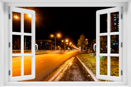 Fototapeta Naklejka Na Ścianę Okno 3D - artistic photo of a night city. Easy blur, unrealistic colors, pasteurization effect