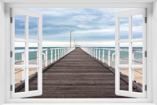 Fototapeta Naklejka Na Ścianę Okno 3D - The old largs bay jetty on an overcast day with no people in adelaide south australia on october 26th 2020