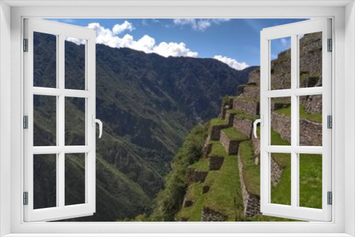 Fototapeta Naklejka Na Ścianę Okno 3D - Stairs - Machu Picchu - The lost city of the Inca in Peru, South America. Set high in the Andes Mountains, is a UNESCO World Heritage Site and one of the New Seven Wonders of the World.