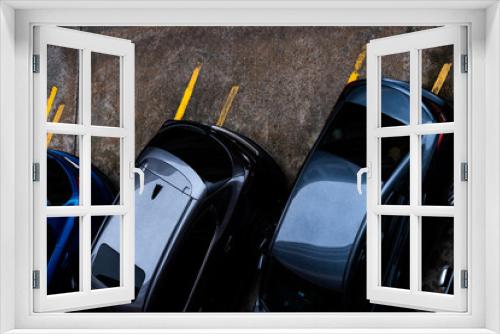 Fototapeta Naklejka Na Ścianę Okno 3D - Top view of car parked at concrete parking lot. Above view of car at parking space. Outside automobile parking area. Used car market. Automotive industry. Used automobile for rental. Car on the road.