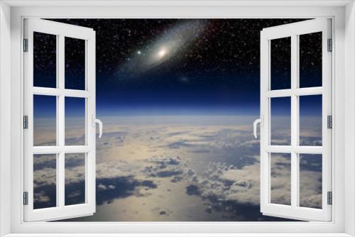 Fototapeta Naklejka Na Ścianę Okno 3D - The Earth in space and the Andromeda galaxy.