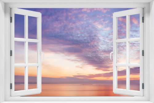 Fototapeta Naklejka Na Ścianę Okno 3D - Colored romantic sky over sea at sunset