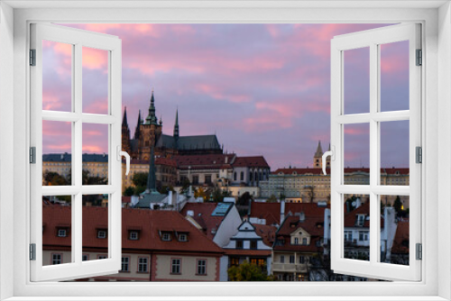 Fototapeta Naklejka Na Ścianę Okno 3D - St. Vitus Cathedral and Prague Castle in the center of Prague at sunset the sky is colored by light