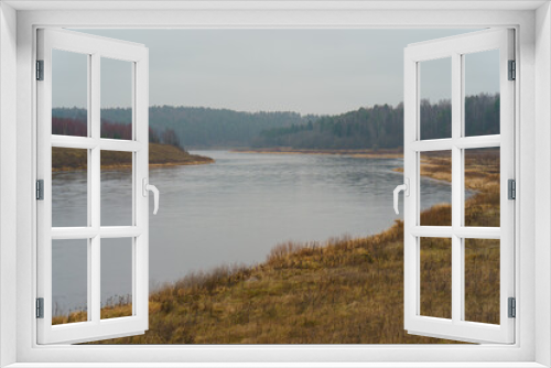 Fototapeta Naklejka Na Ścianę Okno 3D - Photography of Russian country side in rainy day. Autumn landscape. Famous Volga river in Tver region. Concepts of travel and touristic mood and beauty of nature in bad wet weather.