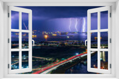 Fototapeta Naklejka Na Ścianę Okno 3D - Beautiful lightning bolt hitting the ocean at night.