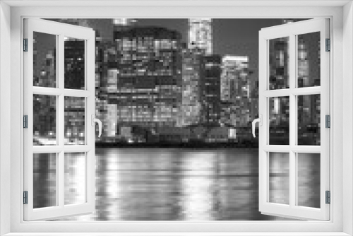 Fototapeta Naklejka Na Ścianę Okno 3D - Black and white picture of New York cityscape at night, USA.