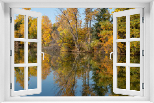 Fototapeta Naklejka Na Ścianę Okno 3D - Colorful Fall Trees with Reflections in Lake