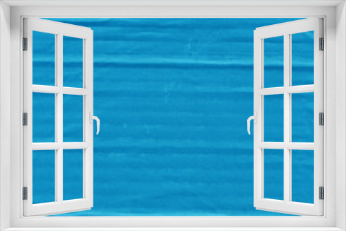 Fototapeta Naklejka Na Ścianę Okno 3D - A blue vintage rough sheet of carton. Recycled environmentally friendly cardboard paper texture. Simple minimalist papercraft background.