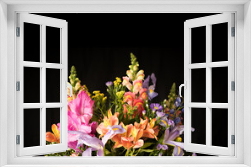 Fototapeta Naklejka Na Ścianę Okno 3D - bouquet of bright flowers isolated on black background. Mothers Day or Valentines Day Concept. Vintage home decor dark tones. Condolence card. Copy Space