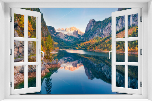 Fototapeta Naklejka Na Ścianę Okno 3D - View from flying drone of Gosausee (Vorderer) lake with Dachstein glacieron background. Attractive evening scene of Austrian Alps, Upper Austria, Europe. Beauty of nature concept background..