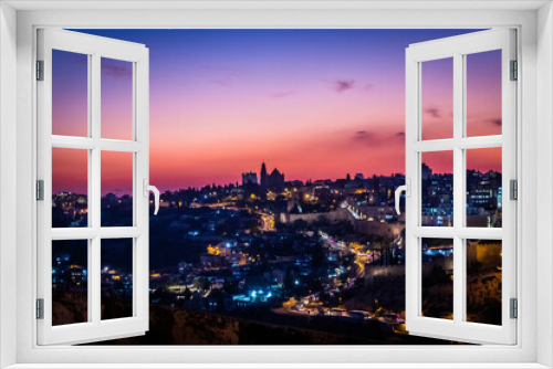 Fototapeta Naklejka Na Ścianę Okno 3D - panorama of jerusalem from 
Jewish cemetery on the Olive Hill with a mosque dome on the rock in the light of the setting sun