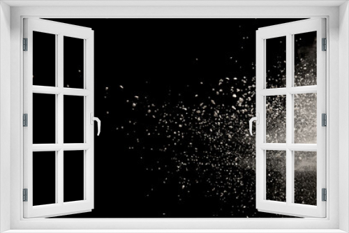 Fototapeta Naklejka Na Ścianę Okno 3D - Freeze motion of white color powder exploding on black  background.