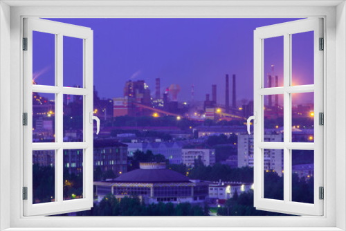 Fototapeta Naklejka Na Ścianę Okno 3D - View of the evening industrial city, a large factory and the river