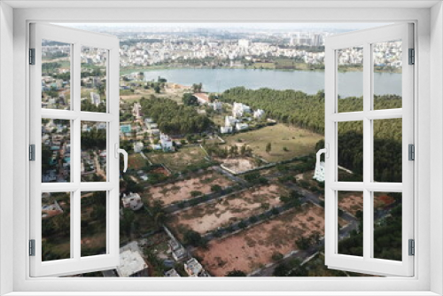 Fototapeta Naklejka Na Ścianę Okno 3D - Aerial lake view of the buildings in the center of Bangalore city 