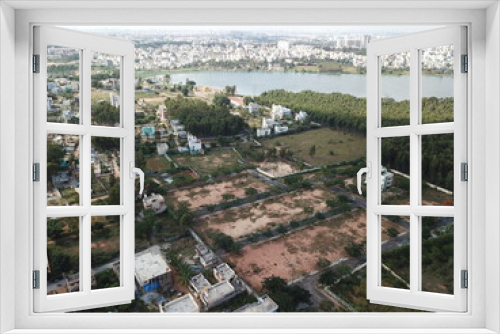 Fototapeta Naklejka Na Ścianę Okno 3D - Aerial lake view of the buildings in the center of Bangalore city 