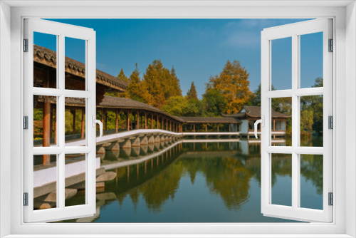 Fototapeta Naklejka Na Ścianę Okno 3D - Chinese pavilion at the West lake in Hangzhou, China, autumn time.