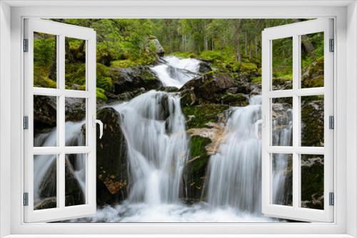 Fototapeta Naklejka Na Ścianę Okno 3D - Soft waterfall in a green forest